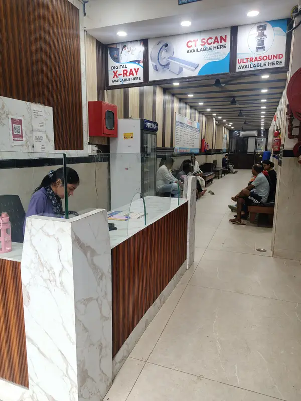 Reception desk and waiting area at Om Imaging Centre